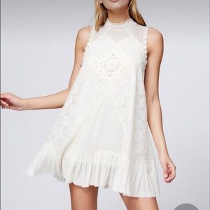 Beautiful boho white dress with lace. Very small stain on front (in photos)